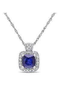 3/4 ct. t.w. Diffused Sapphire and 1/10 ct. t.w. Diamond Halo Pendant with Chain in 10k White Gold