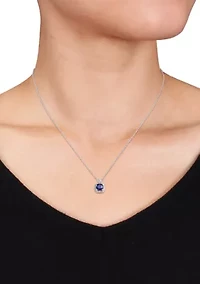 3/4 ct. t.w. Diffused Sapphire and 1/10 ct. t.w. Diamond Halo Pendant with Chain in 10k White Gold