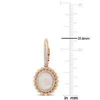 Ethiopian Blue-Hued Opal and 1/4 CT TW Diamond Halo Earrings in 14K Rose Gold