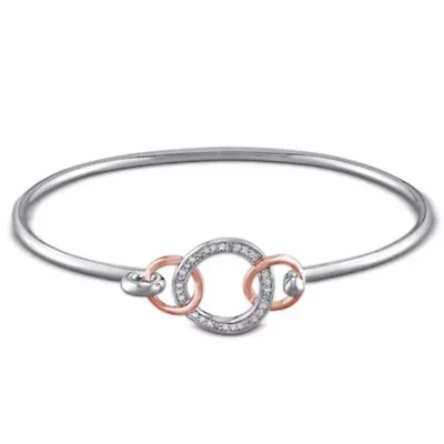 1/10 ct. t.w. Diamond Interlocking Circle Bangle in Sterling Silver
