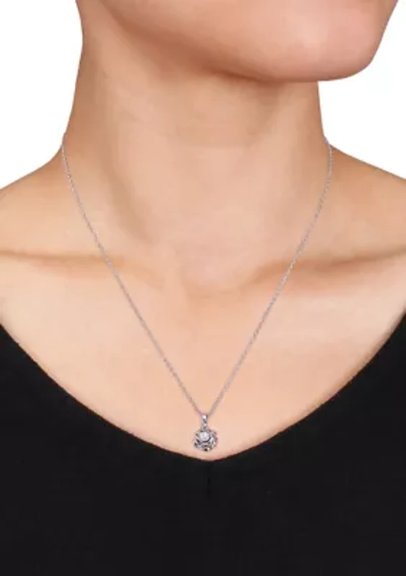  1/10 ct. t.w. Diamond Accent Flower Pendant with Chain in Sterling Silver