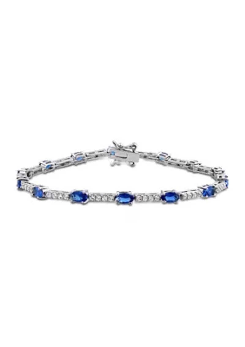 Lab Created 6.72 ct. t.g.w. Created Blue and White Sapphire Station Bracelet in Sterling Silver