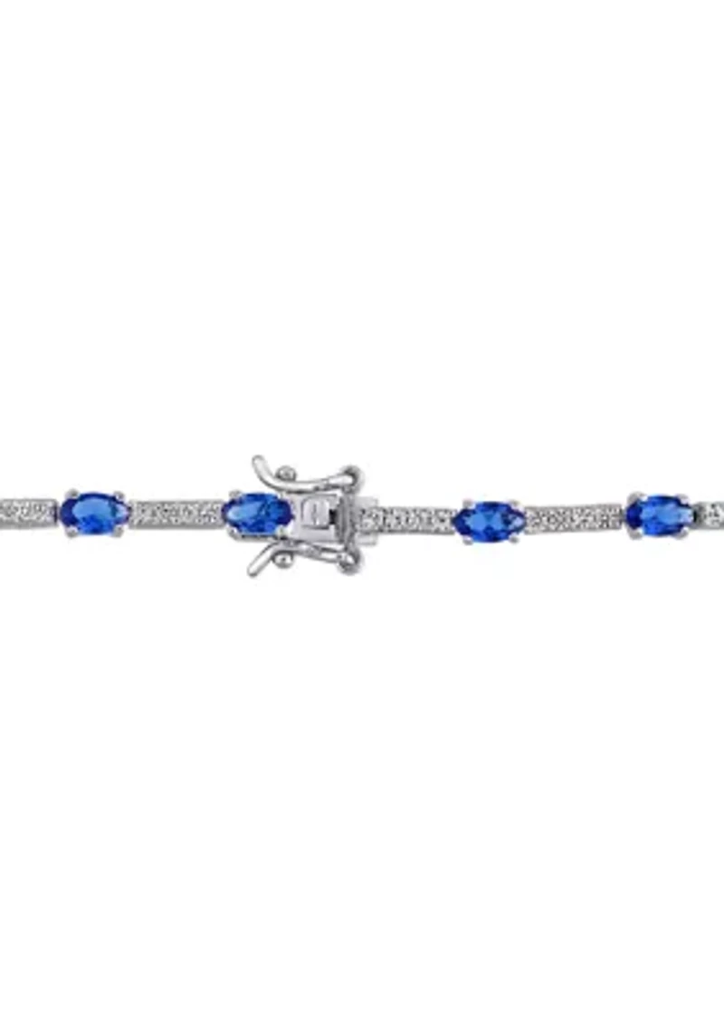 Lab Created 6.72 ct. t.g.w. Created Blue and White Sapphire Station Bracelet in Sterling Silver