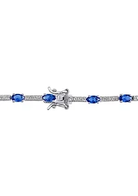 Lab Created 6.72 ct. t.g.w. Created Blue and White Sapphire Station Bracelet in Sterling Silver