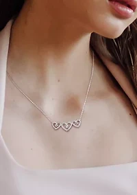 1/2 ct. t.w. White Topaz and 1/5 ct. t.w. Diamond Triple Heart Necklace in Sterling Silver