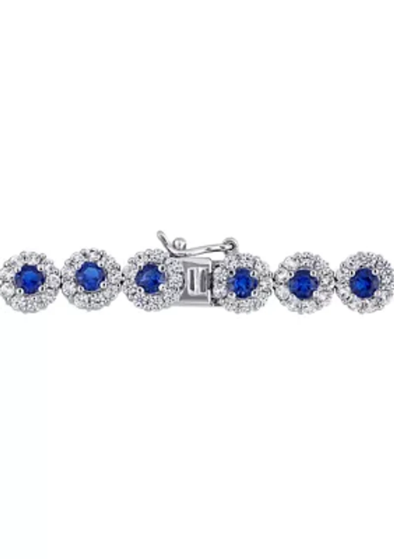 Lab Created 11.28 ct. t.g.w. Created Blue and White Sapphire Halo Tennis Bracelet in Sterling Silver