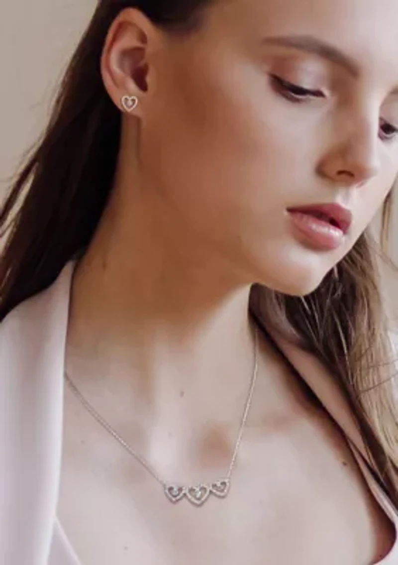 7/8 CT TGW White Topaz and 2/5 CT TW Diamond Heart Earring and Pendant Set in Sterling Silver