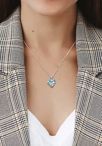 Sky Blue Topaz and Diamond Accent Heart Wrapped Pendant with Chain in Sterling Silver