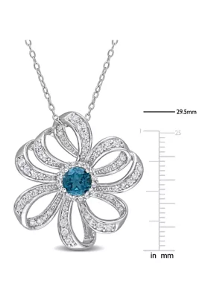 2.26 ct. t.g.w. London Blue Topaz and White Topaz Flower Pendant with Chain in Sterling Silver