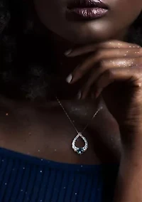 2.69 ct. t.g.w. London Blue Topaz and Sky Blue Topaz Graduated Open Teardrop Pendant with Chain in Sterling Silver