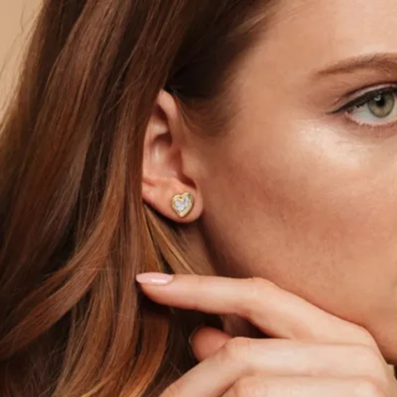 1/6 CT TW Diamond Heart Stud Earrings in Yellow Plated Sterling Silver