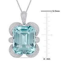 125 ct. t.g.w. Sky Blue Topaz and 4.49 ct. t.w. Diamond Pendant with Chain in 14K White Gold