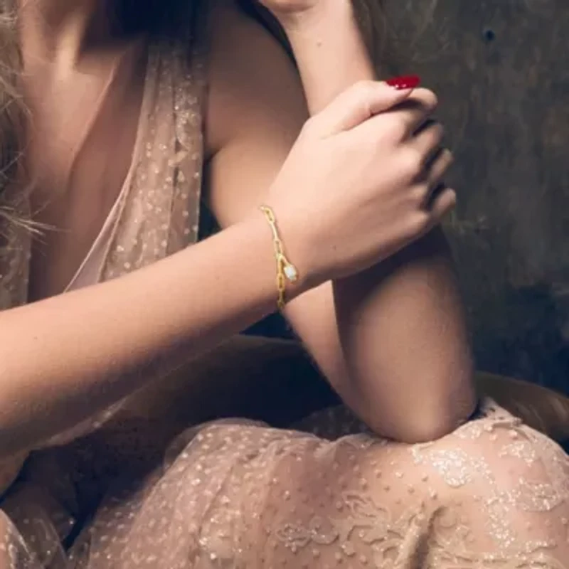 Lab Created Created White Sapphire Oval Link Charm Bracelet in Yellow Plated Sterling Silver