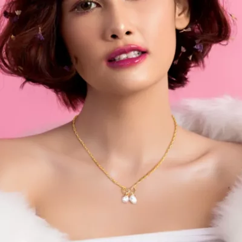 Freshwater Cultured Pearl Bow Pendant with Chain in Yellow Plated Sterling Silver