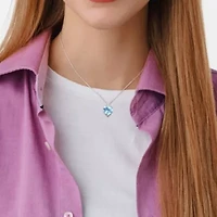 Sky Blue Topaz and 1/10 ct. t.w. Diamond Pendant with Chain in 14K White Gold