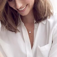 Freshwater Cultured Pearl and Sky Blue Topaz Pendant with Chain in 10K White Gold