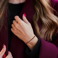 Garnet Tennis Bracelet in Yellow Plated Sterling Silver