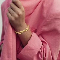 10.3mm Alternating and Twisted Oval Link Chain Bracelet in 14K Yellow Gold, 7"