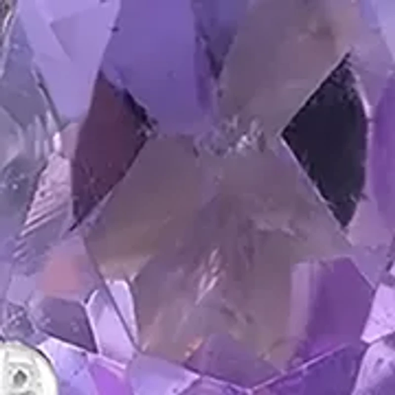 1/10 ct. t.w. Diamond and Amethyst Earrings in Sterling Silver