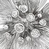 1/10 ct. t.w. Diamond Flower Pendant in Sterling Silver 