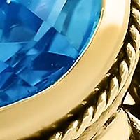 Blue Topaz Ring in Gold Over Silver