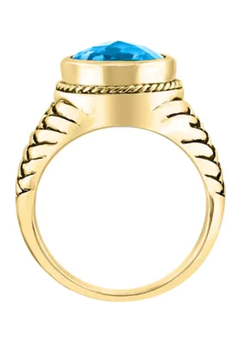 Blue Topaz Ring in Gold Over Silver
