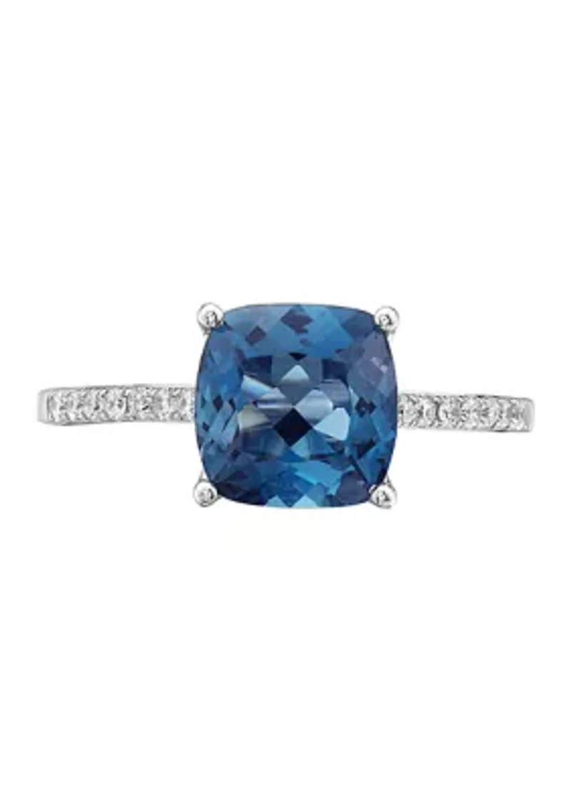 1/8 ct. t.w. Diamonds and 2.5 ct. t.w. London Blue Topaz Ring in 14k White Gold 