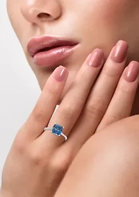 1/8 ct. t.w. Diamonds and 2.5 ct. t.w. London Blue Topaz Ring in 14k White Gold 