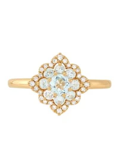 1/10 ct. t.w. Diamond and Sky Blue Topaz Ring in 10K Yellow Gold