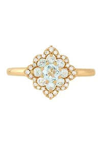 1/10 ct. t.w. Diamond and Sky Blue Topaz Ring in 10K Yellow Gold