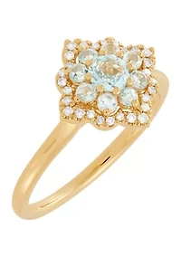 1/10 ct. t.w. Diamond and Sky Blue Topaz Ring in 10K Yellow Gold