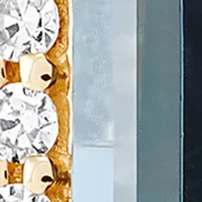 1/4 ct. t.w. Diamond and London Blue Topaz Ring in 10K Yellow Gold