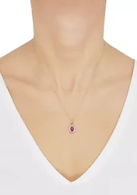 1/10 ct. t.w. Diamond and Ruby Pendant Necklace with 18" Singapore Chain in 14K Yellow Gold