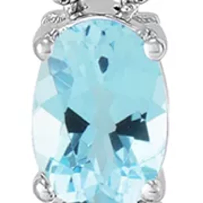 Lab Grown Sky Blue Topaz and Lab Grown Sapphire Set in Sterling Silver