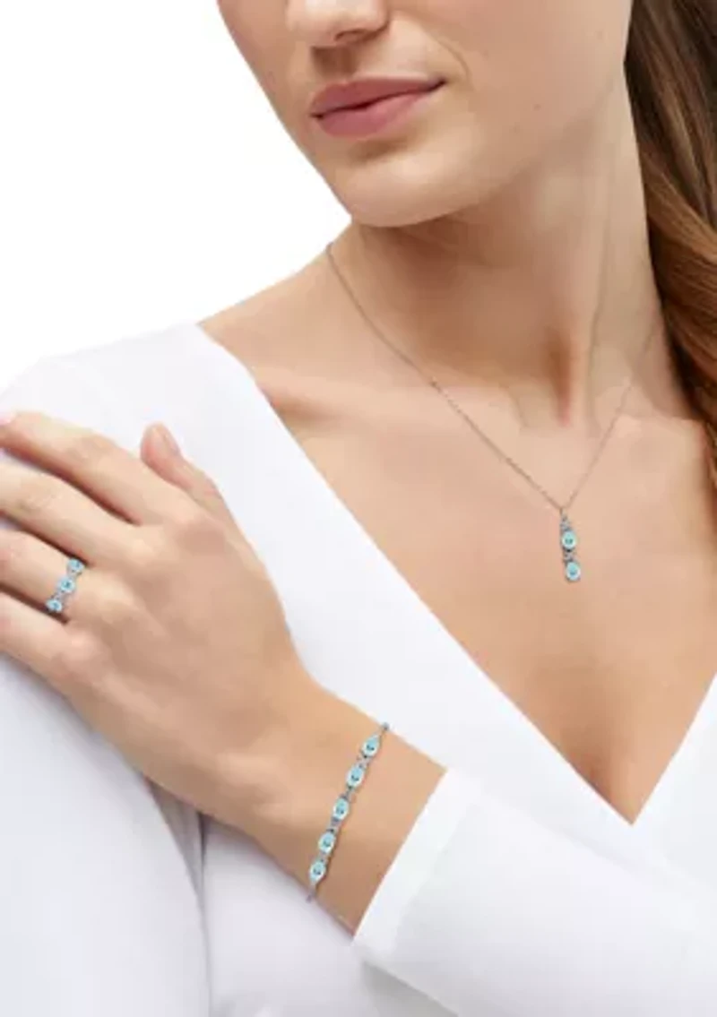 Lab Grown Sky Blue Topaz and Lab Grown Sapphire Set in Sterling Silver