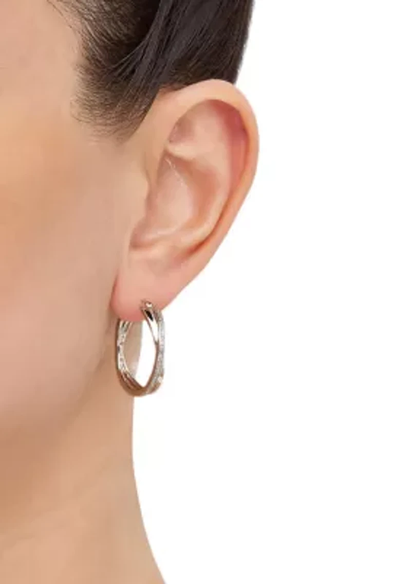 1/10 ct. t.w. Diamond Hoop Earrings in Sterling Silver and 3K White Gold