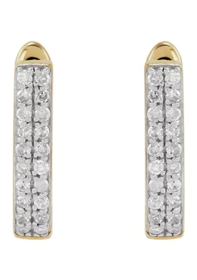 1/10 ct. t.w. Diamond Oval Huggie Earrings in 10K Yellow Gold