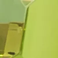 Ring featuring 1 1/3 cts. Green Apple Peridot™, 1/5 cts. Chocolate Diamonds®, 1/4 cts. Nude Diamonds™ set in 14K Honey Gold™