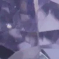 5/8 ct. 6MMx4MM Pear Tanzanite and White Topaz Crown Stud Earrings, Sterling Silver