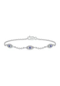 1/5 ct. t.w. Diamond and 1/8 ct. t.w. Created Blue Sapphire Evil Eye Bracelet in Sterling Silver