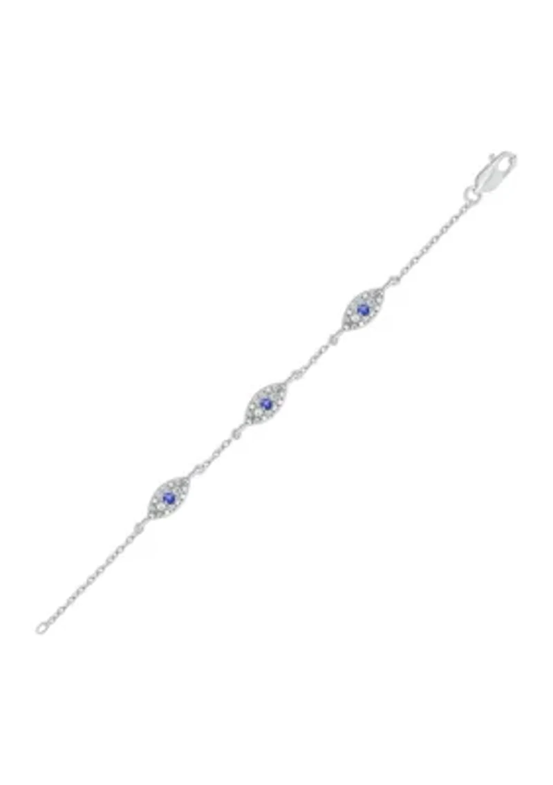 1/5 ct. t.w. Diamond and 1/8 ct. t.w. Created Blue Sapphire Evil Eye Bracelet in Sterling Silver
