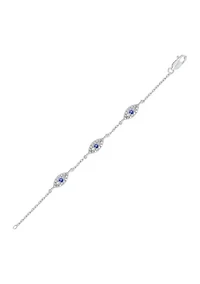 1/5 ct. t.w. Diamond and 1/8 ct. t.w. Created Blue Sapphire Evil Eye Bracelet in Sterling Silver