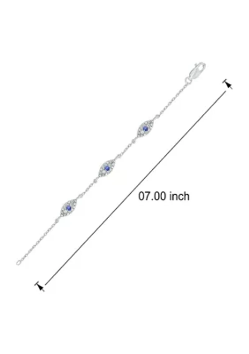 1/5 ct. t.w. Diamond and 1/8 ct. t.w. Created Blue Sapphire Evil Eye Bracelet in Sterling Silver
