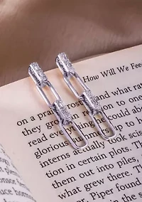 1/ ct. t.w. Diamond Paper Clip Styled Earring in Sterling Silver
