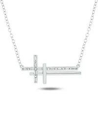 1/10 ct. t.w. Baguette Round White Diamond Sideways Cross Pendant Necklace in Gold Over Sterling Silver