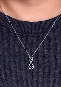 1/8 ct. t.w. Baguette Round White Diamond Infinity Pendant Necklace in Sterling Silver