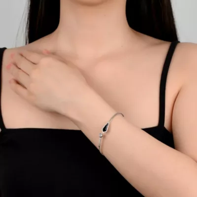 Sterling Silver 14x5mm Triangle Black Onyx and Cubic Zirconia 7.25 Inch Bangle Bracelet