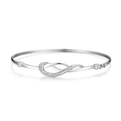 Diamond Accent Infinity Swirl Bangle Bracelet in Rhodium Plated Sterling Silver
