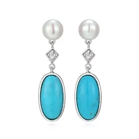 Genuine Turquoise, Pearl, and White Topaz Drop Earring in Rhodium Plated Sterling Silver