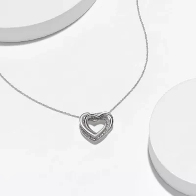 Diamond Accent Heart Pendant In Rhodium Plated Sterling Silver On An 18" Chain